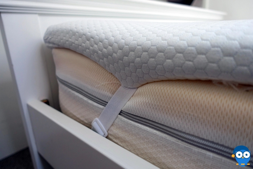 memory foam mattress topper on a mattress.